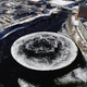Ilustración para el artículo titulado Este extraño disco de hielo que ha aparecido en un río en Maine es completamente natural. Así se forma